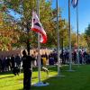 Northern Arapaho Day 2023 - Flag raising ceremony at ACC's Littleton Campus in front of the main building.