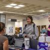 ACC students at a resource table in the student lounge at the Littleton Campus.