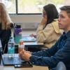 ACC students sitting in a classroom at the Littleton Campus