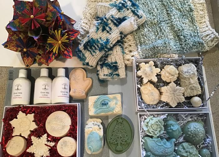 Hand-crafted soaps, knitted items, and lotions.