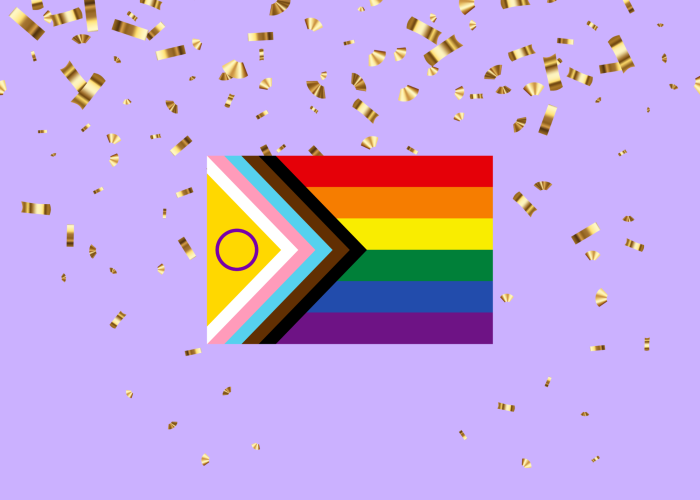 Pride flag on a lavendar background with confetti around it.