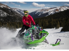 Person on snow mobile (photo by Alexis Salminen)