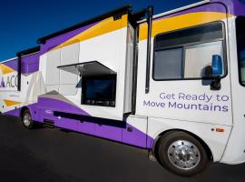 ACC Mobile Learning Lab passenger side exterior with TV cabinet open