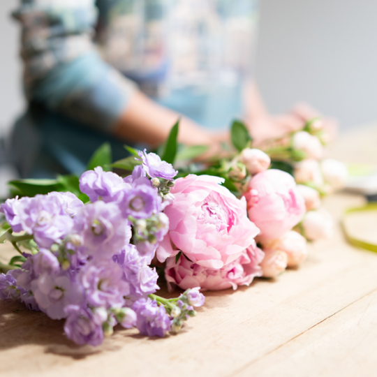person with bouquet of flowers