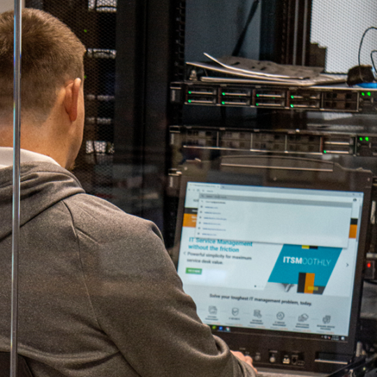 Student in server room at ACC's Sturm Campus at Castle Rock