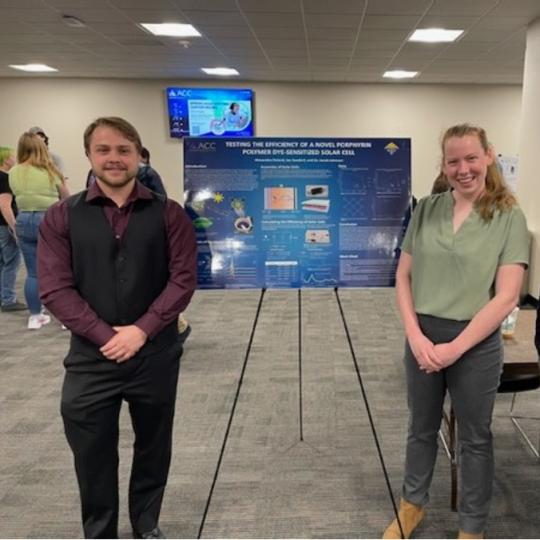 Pictured (left to right): Ian Seedorf and Alexandra Poland. Ian and Alexandra presented the poster on the Porphyrin Polymer Novel Dye-Sensitized Solar Cell.