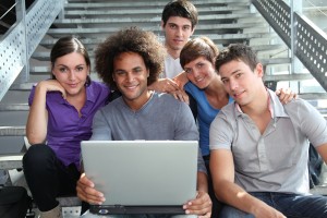 Group of college students with laptop computer