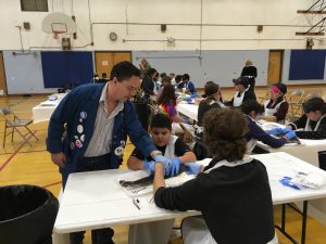 CCB students dissecting sharks at ACC